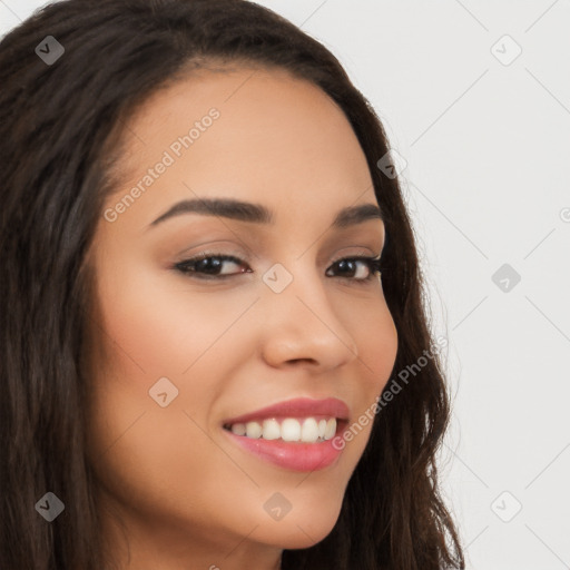 Joyful latino young-adult female with long  brown hair and brown eyes