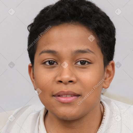 Joyful latino child female with short  brown hair and brown eyes