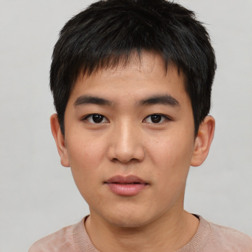 Neutral asian young-adult male with short  brown hair and brown eyes