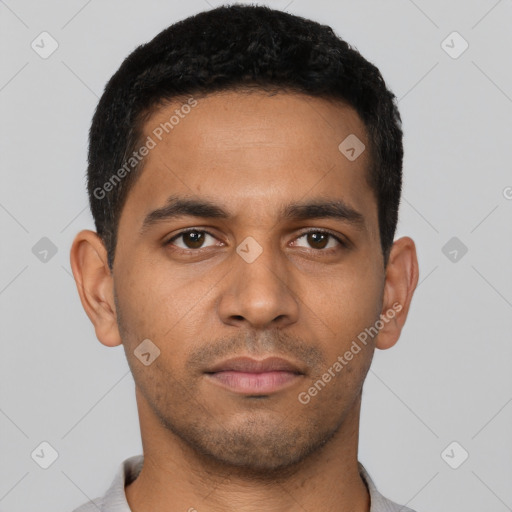 Neutral latino young-adult male with short  black hair and brown eyes