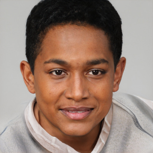 Joyful black young-adult male with short  brown hair and brown eyes