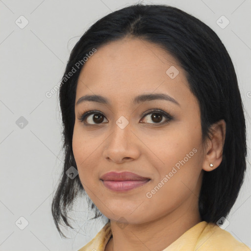 Joyful asian young-adult female with medium  black hair and brown eyes