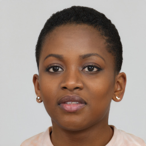 Neutral black young-adult female with short  brown hair and brown eyes