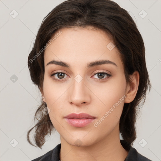 Neutral white young-adult female with medium  brown hair and brown eyes