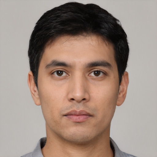 Neutral asian young-adult male with short  black hair and brown eyes