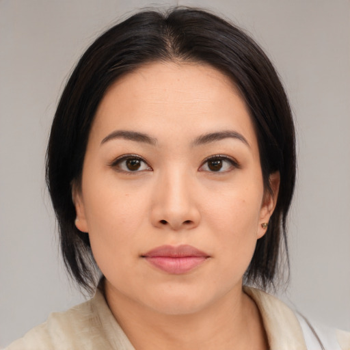 Neutral asian young-adult female with medium  black hair and brown eyes