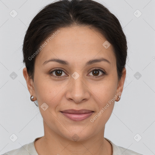 Joyful white adult female with short  brown hair and brown eyes