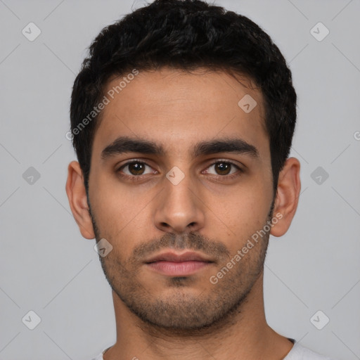 Neutral latino young-adult male with short  black hair and brown eyes