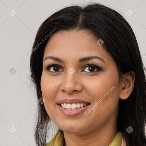 Joyful latino young-adult female with long  brown hair and brown eyes