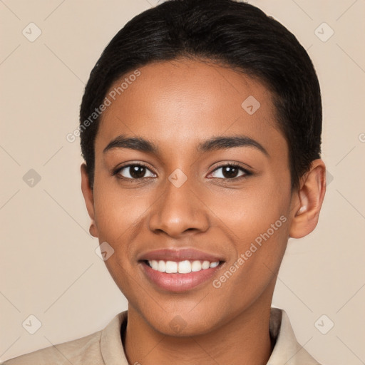 Joyful latino young-adult female with short  brown hair and brown eyes