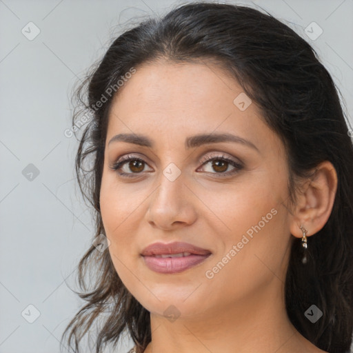 Joyful white young-adult female with long  brown hair and brown eyes