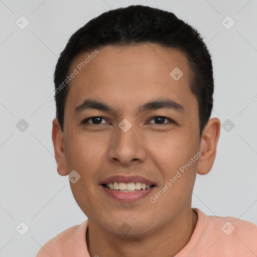 Joyful latino young-adult male with short  brown hair and brown eyes