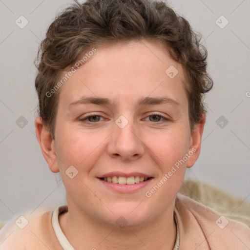 Joyful white young-adult female with short  brown hair and grey eyes