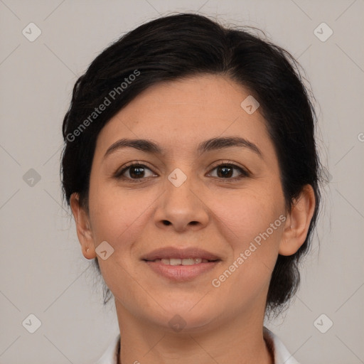 Joyful latino young-adult female with medium  brown hair and brown eyes