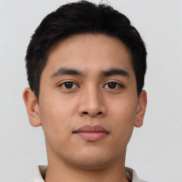 Neutral asian young-adult male with short  brown hair and brown eyes