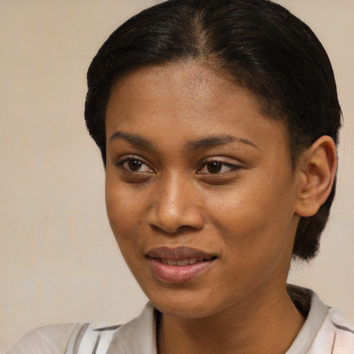 Joyful latino young-adult female with short  brown hair and brown eyes