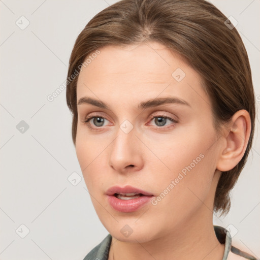 Neutral white young-adult female with medium  brown hair and grey eyes