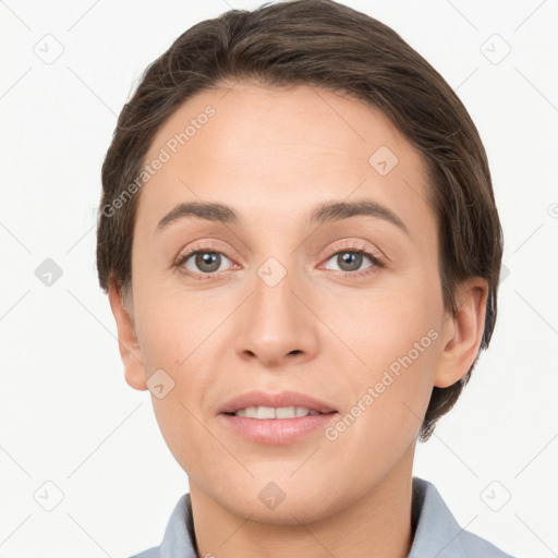 Joyful white young-adult female with short  brown hair and brown eyes