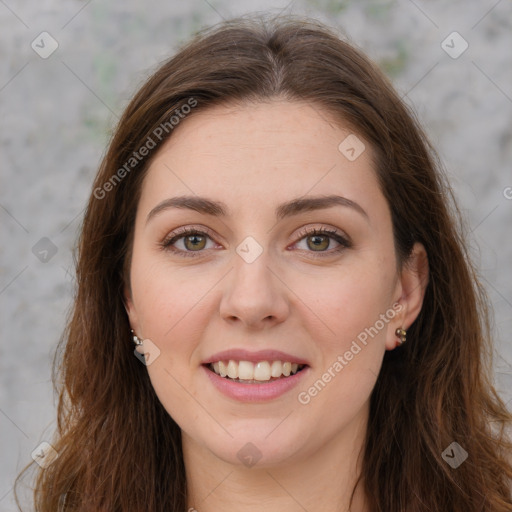 Joyful white young-adult female with long  brown hair and green eyes