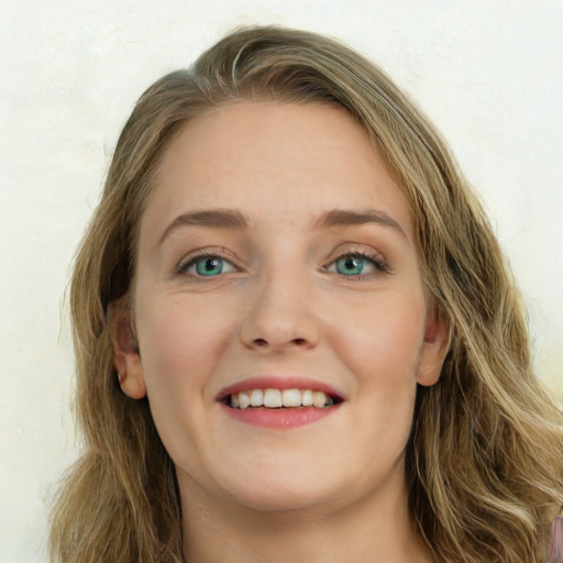 Joyful white young-adult female with long  brown hair and blue eyes