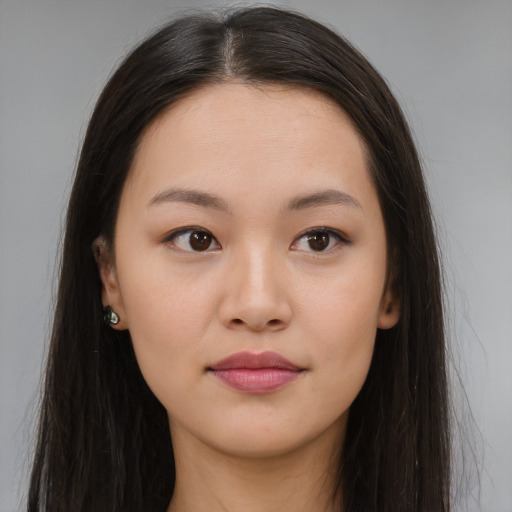 Neutral asian young-adult female with long  brown hair and brown eyes