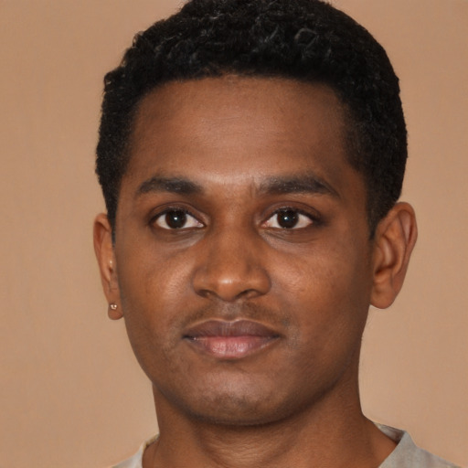 Neutral black young-adult male with short  black hair and brown eyes