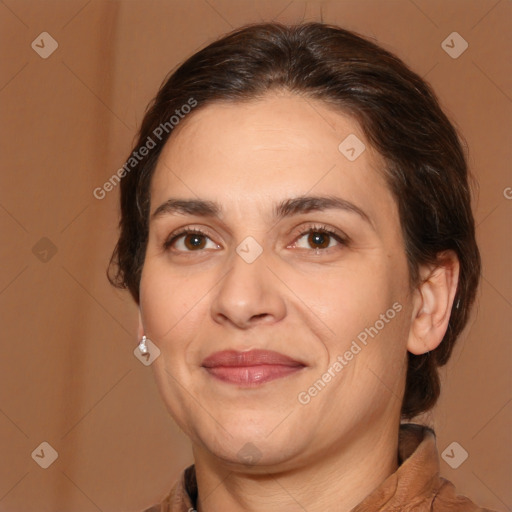 Joyful white adult female with medium  brown hair and brown eyes