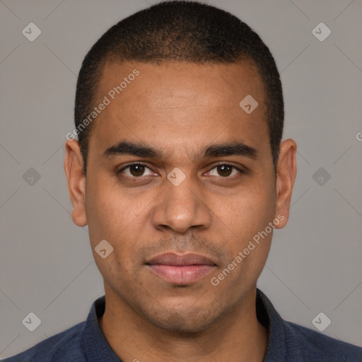 Joyful latino young-adult male with short  brown hair and brown eyes