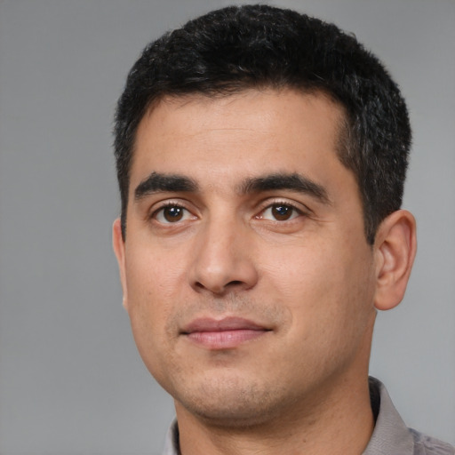 Neutral white young-adult male with short  black hair and brown eyes