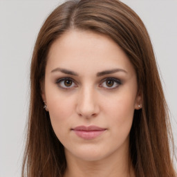 Neutral white young-adult female with long  brown hair and brown eyes