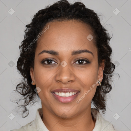 Joyful black young-adult female with medium  brown hair and brown eyes