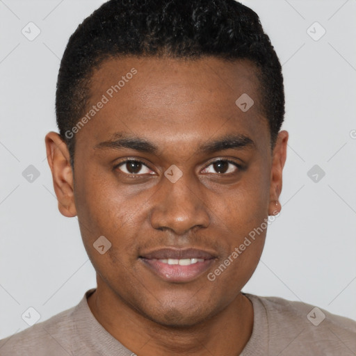 Joyful black young-adult male with short  brown hair and brown eyes