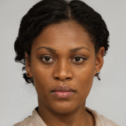 Neutral black young-adult female with short  brown hair and brown eyes