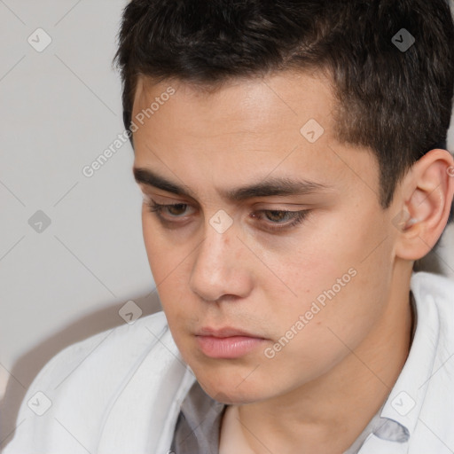 Neutral white young-adult male with short  brown hair and brown eyes