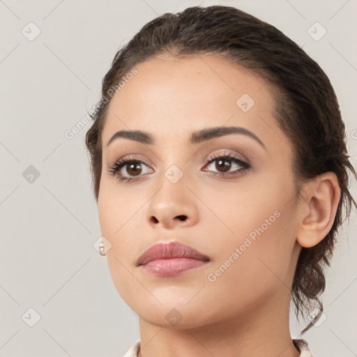 Neutral white young-adult female with medium  brown hair and brown eyes