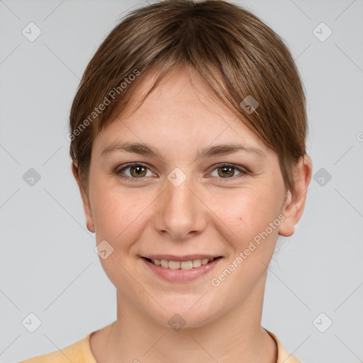 Joyful white young-adult female with short  brown hair and grey eyes