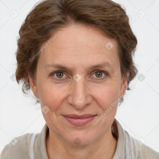 Joyful white adult female with short  brown hair and brown eyes