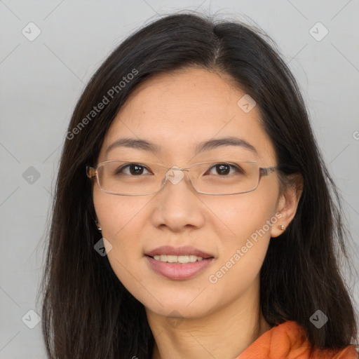 Joyful white adult female with long  brown hair and brown eyes