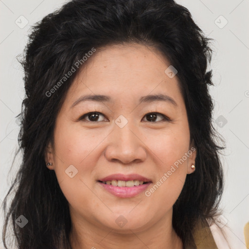 Joyful asian young-adult female with long  brown hair and brown eyes