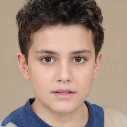 Joyful white child male with short  brown hair and brown eyes