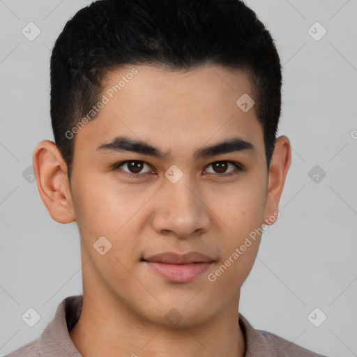 Joyful latino young-adult male with short  brown hair and brown eyes