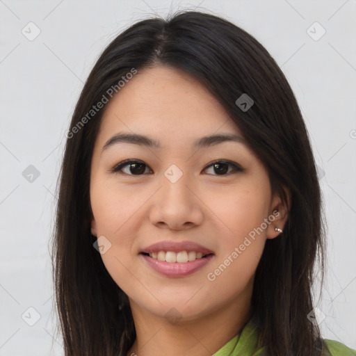 Joyful asian young-adult female with long  brown hair and brown eyes