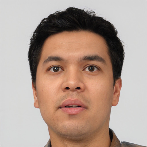 Neutral asian young-adult male with short  black hair and brown eyes