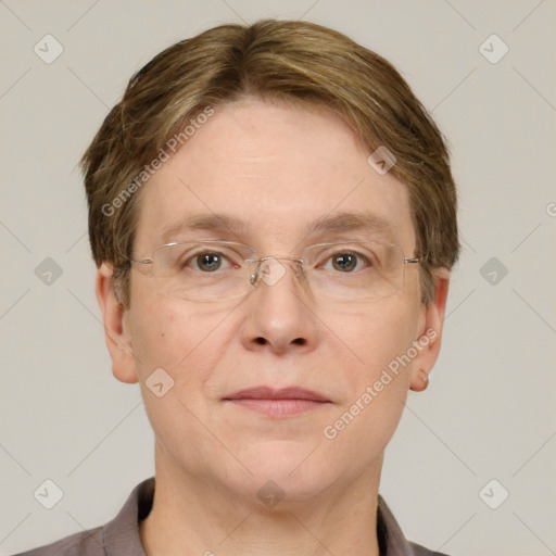 Joyful white adult female with short  brown hair and grey eyes