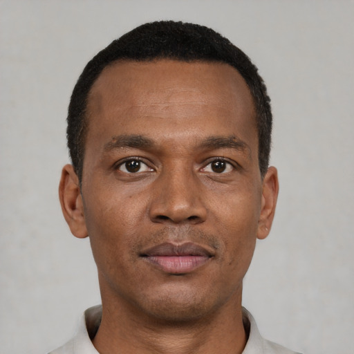 Neutral black young-adult male with short  black hair and brown eyes