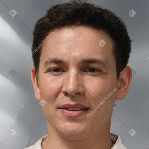 Joyful white adult male with short  brown hair and brown eyes