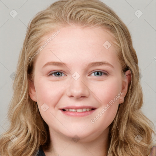 Joyful white young-adult female with long  brown hair and blue eyes