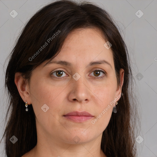 Joyful white adult female with long  brown hair and grey eyes