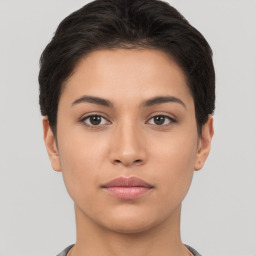 Neutral white young-adult female with short  brown hair and brown eyes