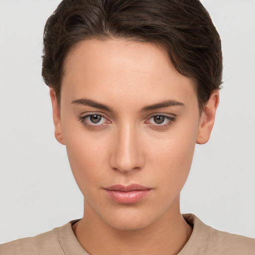 Neutral white young-adult female with short  brown hair and brown eyes